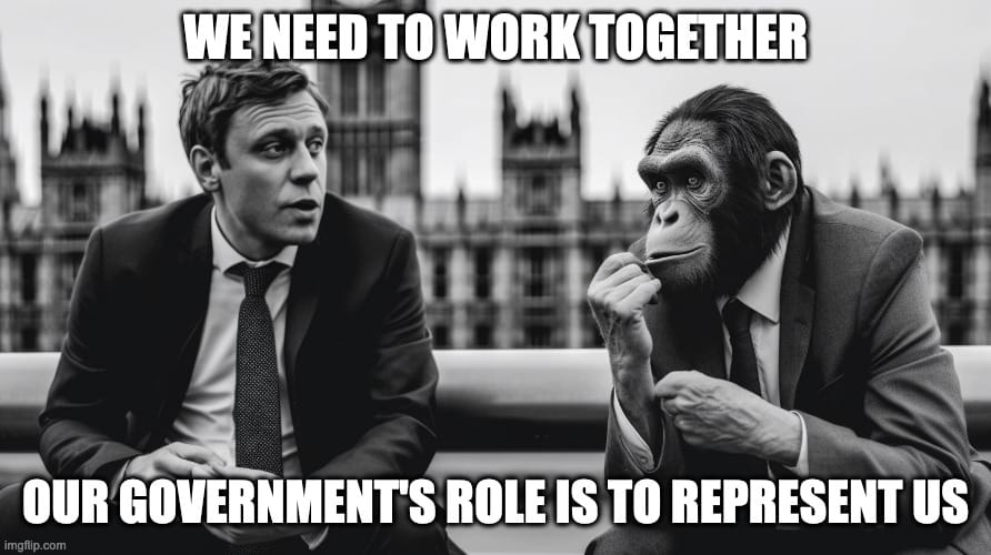 IMAGE OF AN MP AND APE TOGETHER - CAPTION READS OUR GOVERNMENT'S ROLE IS TO REPRESENT US 