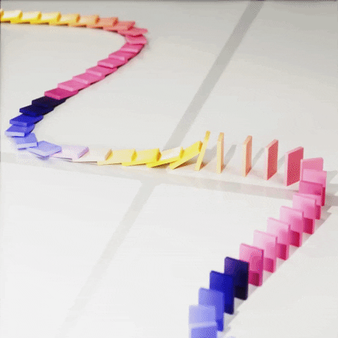 GIF OF DOMINOES TOPPLING OVER